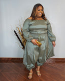 Front view of plus size olive two piece pant set with off shoulder top and flowy fit