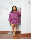 Curvy woman styled in luxury berry satin mini dress