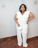 Plus size white ruffle sleeve jumpsuit with wide leg fit