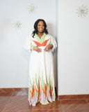 Plus size resort wear dress with airy pleated fabric and empire waist
