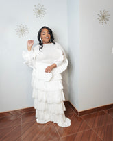 Curvy woman wearing elegant white statement blouse