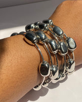 Sculptural Pebble Charm Bangle Bracelet