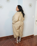 Back view of plus size beige trouser set with elastic ankle detail
