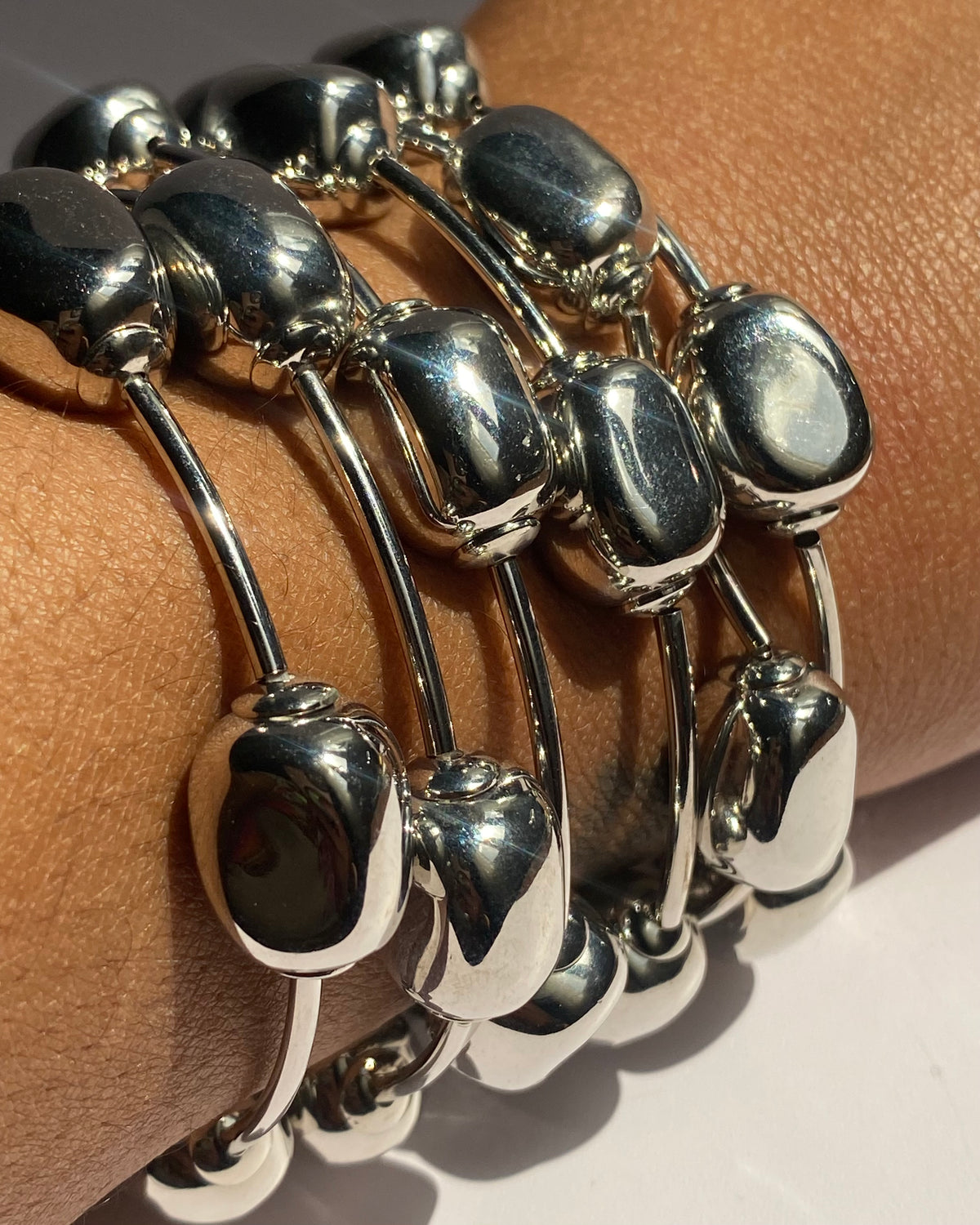 Sculptural Pebble Charm Bangle Bracelet