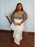 Oversized flowy statement pants for plus size women with elastic waistband styled with leopard top