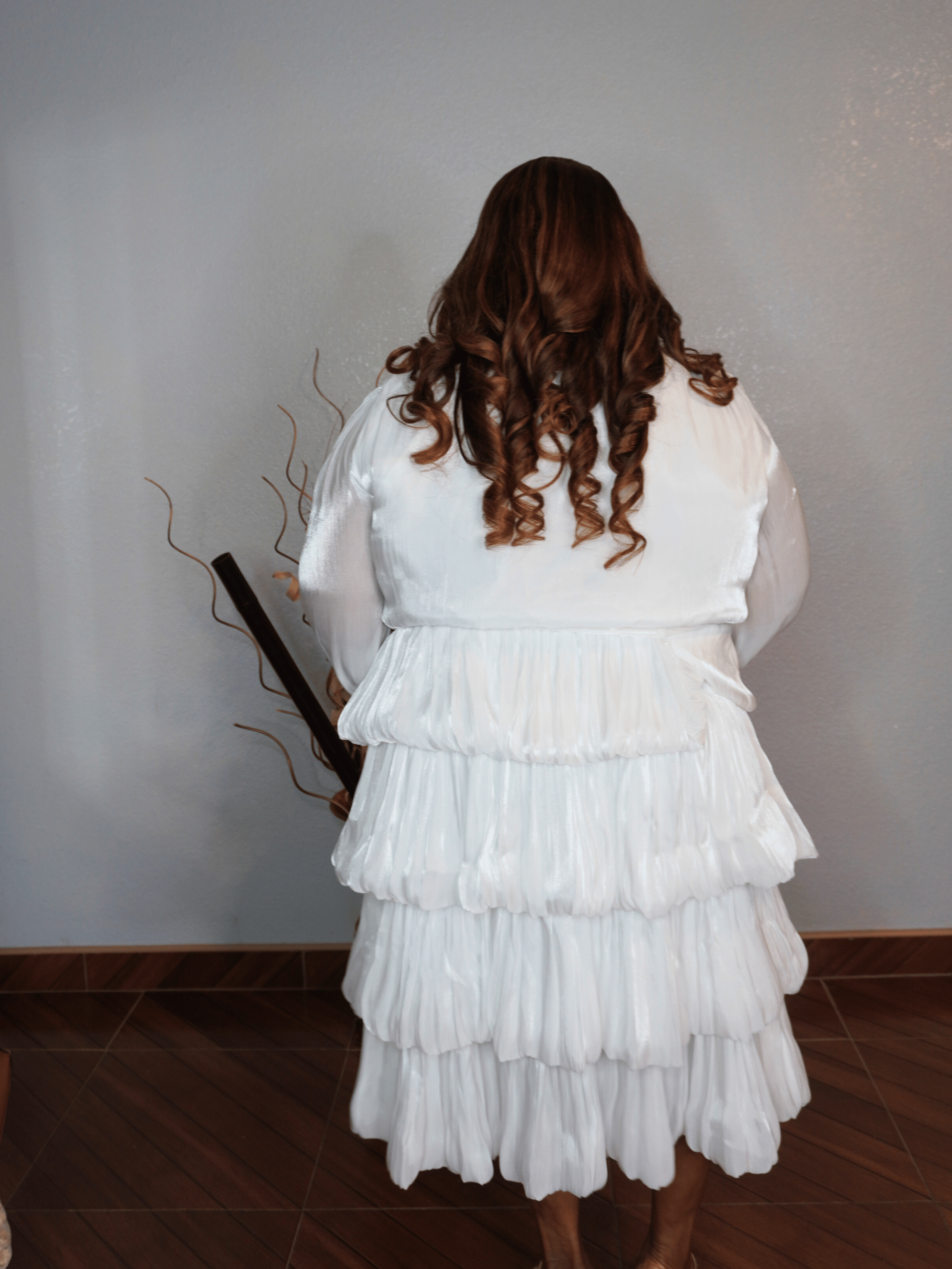 Plus size white organza tiered dress with long sleeves back view from Lysaire boutique