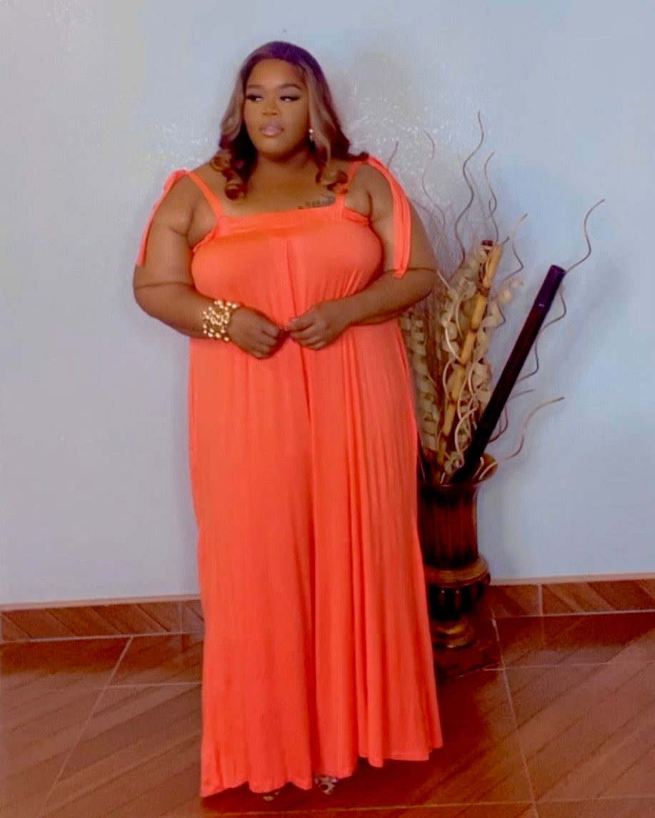 Plus size orange oversized wide leg jumpsuit with stretch fabric from Lysaire boutique
