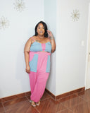 Curvy woman wearing matching two piece outfit with pockets