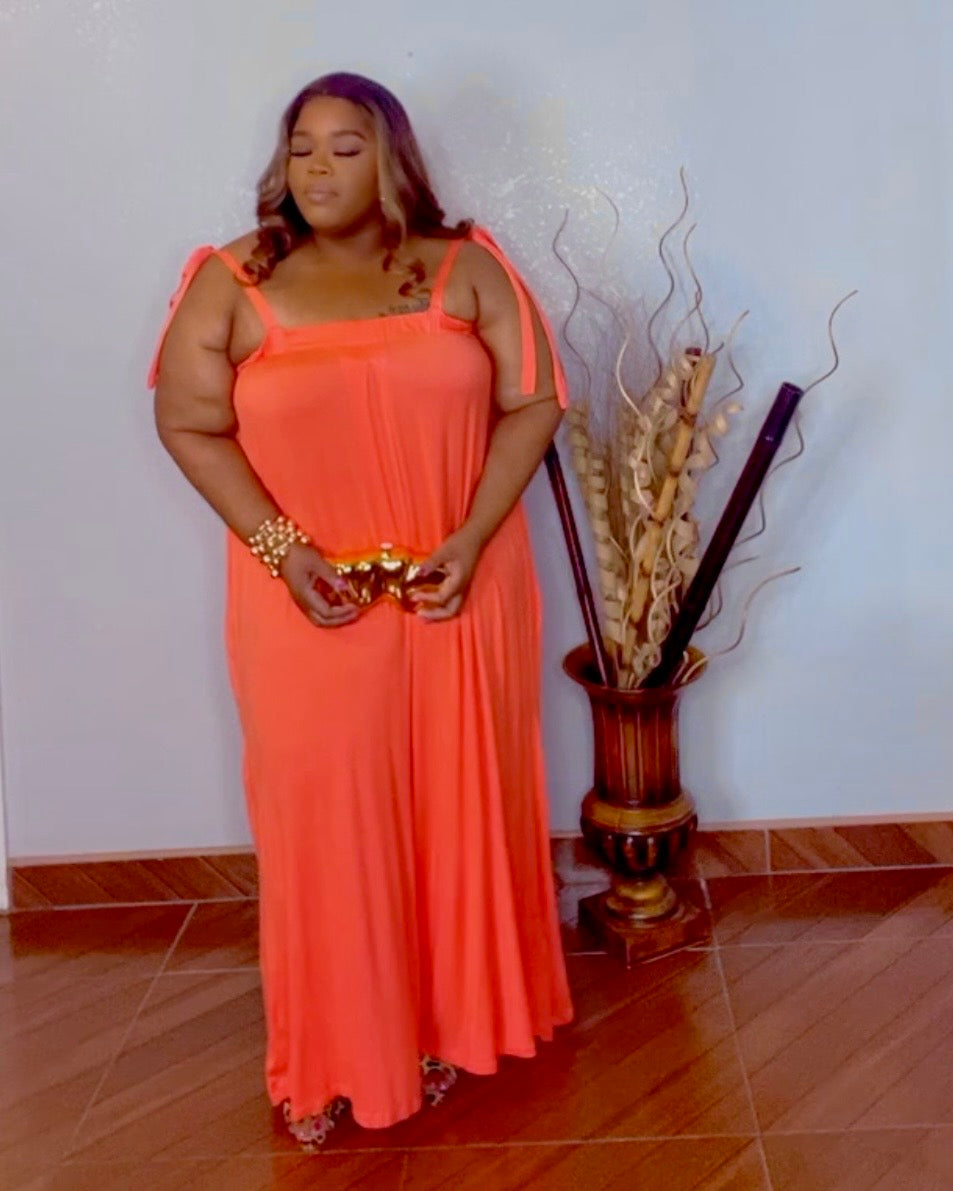 Plus size orange oversized wide leg jumpsuit with stretch fabric tapered waist from Lysaire boutique