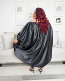 Plus size dramatic sleeve blouse with flowing silhouette