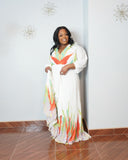 Front view of lightweight pleated plus size maxi dress with tropical print